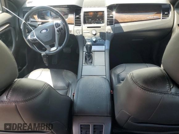 2014 Ford Taurus Limited with VIN 1FAHP2F84EG121559, listed as a Copart auction lot 61764825 with 82,548 mi miles and Salvage title. Bid and sale history available at DreamBid. Image 8.