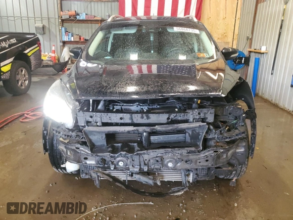 2018 Ford Escape Titanium with VIN 1FMCU9J9XJUA01357, listed as a Copart auction lot 56868735 with 67,315 mi miles and Salvage title. Bid and sale history available at DreamBid. Image 5.