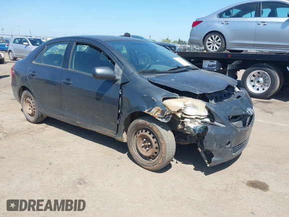 2009 Toyota Yaris with VIN JTDBT903891349784, listed as a IAAI auction lot 42135557 with 244,107 mi miles. Bid and sale history available at carsss.com. Image 1.
