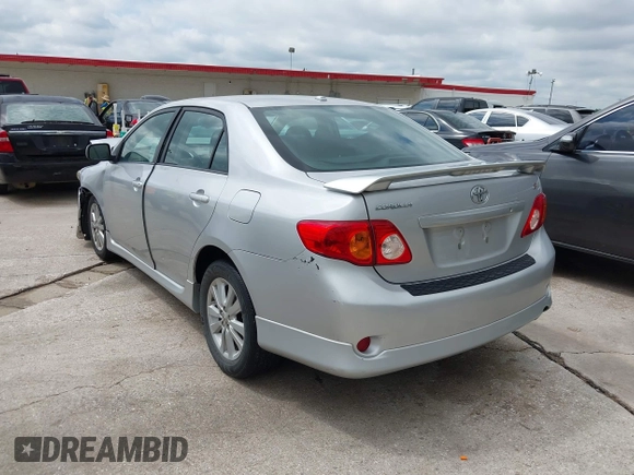 2010 Toyota Corolla with VIN 2T1BU4EE1AC480579, listed as a IAAI auction lot 42210623 with 123,795 mi miles. Bid and sale history available at carsss.com. Image 3.