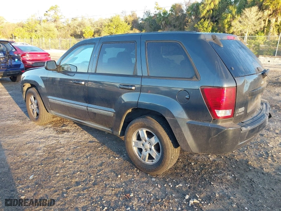 2007 Jeep Grand Cherokee Laredo with VIN 1J8GS48K17C655999, listed as a IAAI auction lot 41590500 with 290,695 mi miles. Bid and sale history available at carsss.com. Image 3.