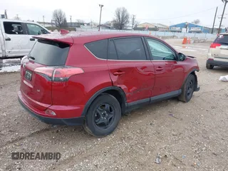 2018 Toyota RAV4 LE with VIN 2T3ZFREV9JW514778, listed as a IAAI auction lot 41202060 with 99,405 mi miles. Bid and sale history available at carsss.com. Image 4.