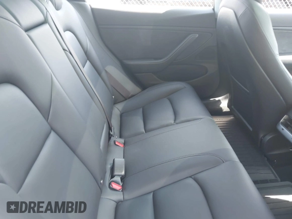 2018 Tesla Model 3 Long Range Battery z VIN 5YJ3E1EB9JF086703, wystawiony jako IAAI lot #42290193 z przebiegiem 46 255 mil mil oraz . Historia ofert i sprzedaży dostępna na DreamBid. Obrazek 8.