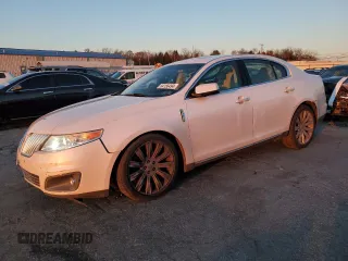 2012 Lincoln MKS with VIN 1LNHL9ER9CG805556, listed as a Copart auction lot 84156494 with 144,332 mi miles and Salvage Title. Bid and sale history available at DreamBid. Image 1.
