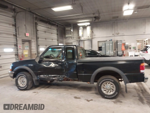 1999 Ford Ranger XL with VIN 1FTZR15V4XPB56809, listed as a IAAI auction lot 41874991 with 165,487 mi miles. Bid and sale history available at carsss.com. Image 14.