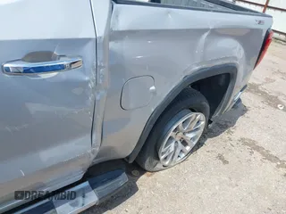 2020 GMC Sierra 1500 SLT z VIN 3GTU9DED9LG299417, wystawiony jako IAAI lot #42168562 z przebiegiem Nie podano mil oraz . Historia ofert i sprzedaży dostępna na DreamBid. Obrazek 17.