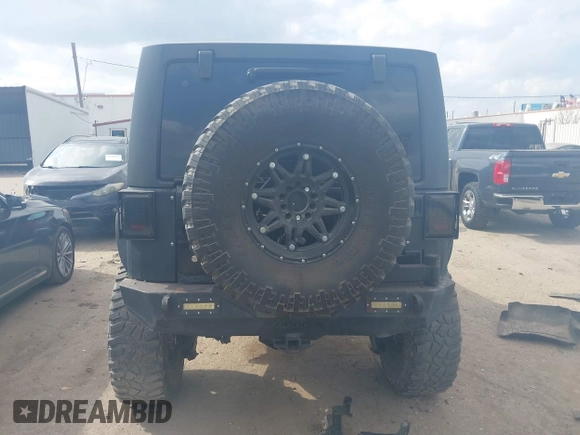 2014 Jeep Wrangler Unlimited Rubicon X with VIN 1C4HJWFG3EL274905, listed as a IAAI auction lot 41512631 with 123,961 mi miles and . Bid and sale history available at DreamBid. Image 17.