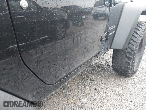 2015 Jeep Wrangler Willys Wheeler with VIN 1C4AJWAG8FL759566, listed as a IAAI auction lot 42716154 with 95,744 mi miles and . Bid and sale history available at DreamBid. Image 13.