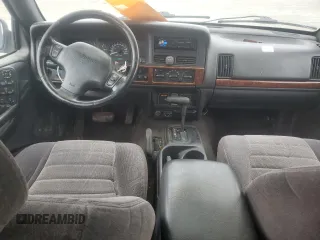 1998 Jeep Grand Cherokee Laredo with VIN 1J4GZ58S2WC281923, listed as a Copart auction lot 44010885 with 210,959 mi miles and Salvage Title. Bid and sale history available at carsss.com. Image 8.