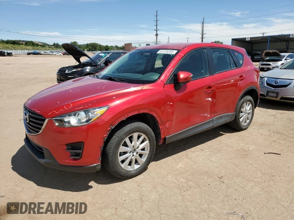 2016 Mazda CX-5 Sport with VIN JM3KE4BYXG0702655, listed as a Copart auction lot 63120205 with 64,403 mi miles and Salvage title. Bid and sale history available at DreamBid. Image 1.