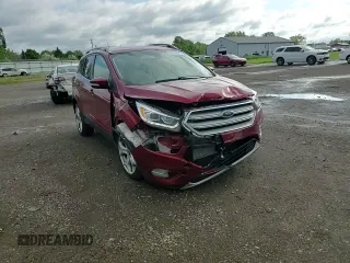 2019 Ford Escape Titanium with VIN 1FMCU0J98KUC00873, listed as a Copart auction lot 61674305 with 53,554 mi miles and Salvage title. Bid and sale history available at DreamBid. Image 14.