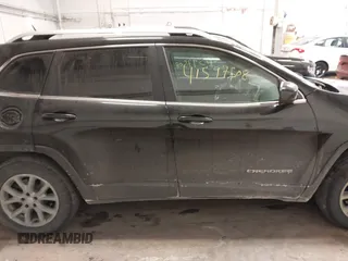 2014 Jeep Cherokee Latitude z VIN 1C4PJMCS0EW321380, wystawiony jako IAAI lot #41597508 z przebiegiem 173 991 mil mil oraz . Historia ofert i sprzedaży dostępna na DreamBid. Obrazek 13.