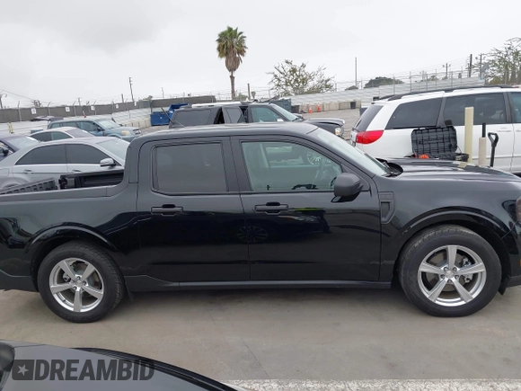 2023 Ford Maverick XL z VIN 3FTTW8E39PRA28323, wystawiony jako IAAI lot #42482477 z przebiegiem 24 651 mil mil oraz . Historia ofert i sprzedaży dostępna na DreamBid. Obrazek 13.