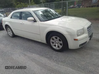 2005 Chrysler 300 Touring with VIN 2C3AA53G75H663208, listed as a IAAI auction lot 42180449 with 353,034 mi miles and . Bid and sale history available at carsss.com. Image 1.