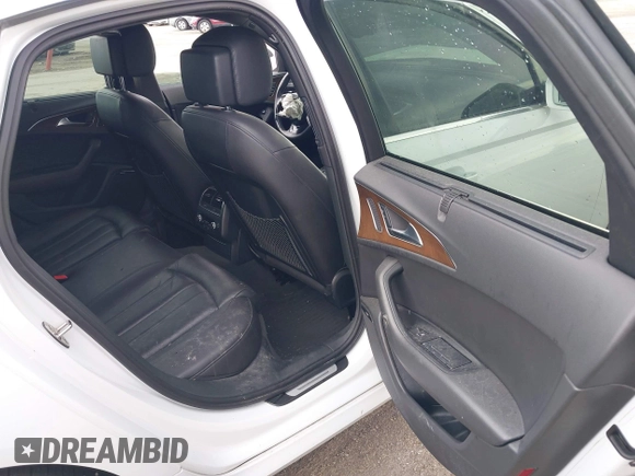 2014 Audi A6 Prestige z VIN WAUHMAFC6EN098487, wystawiony jako IAAI lot #41908034 z przebiegiem 146 298 mil mil oraz . Historia ofert i sprzedaży dostępna na DreamBid. Obrazek 8.