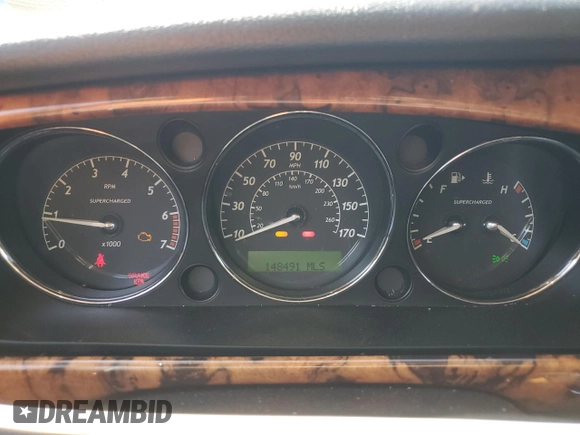 2004 Jaguar XJ R z VIN SAJWA73B44TG20291, wystawiony jako Copart lot #54452375 z przebiegiem 148 491 mil mil oraz Czysty tytuł • Clean title. Historia ofert i sprzedaży dostępna na DreamBid. Obrazek 9.