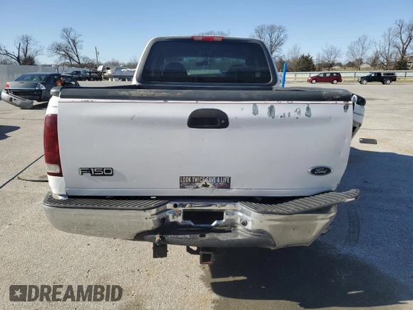 2000 Ford F-150 XL with VIN 1FTRX18W5YKB13685, listed as a Copart auction lot 48286865 with 249,053 mi miles and Salvage Title. Bid and sale history available at carsss.com. Image 6.