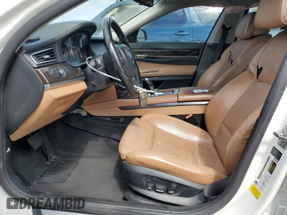 2012 BMW 7 Series 750Li с VIN WBAKB8C55CC962772, выставлен на аукционе Copart как лот 57621525 с пробегом 127 259 миль миль и Списание • Salvage title. История ставок и продаж доступна на DreamBid. Изображение 7.