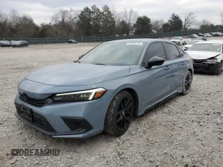 2022 Honda Civic Sport z VIN 2HGFE2F52NH542294, wystawiony jako Copart lot #87439114 z przebiegiem 60 548 mil mil oraz Czysty tytuł • Clean title. Historia ofert i sprzedaży dostępna na DreamBid. Obrazek 1.