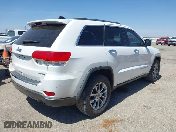 2014 Jeep Grand Cherokee Limited with VIN 1C4RJEBG6EC453833, listed as a IAAI auction lot 41901390 with 148,576 mi miles and . Bid and sale history available at DreamBid. Image 4.