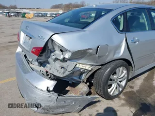 2010 Infiniti M with VIN JN1CY0AR1AM961741, listed as a IAAI auction lot 41905630 with 100,170 mi miles. Bid and sale history available at carsss.com. Image 6.