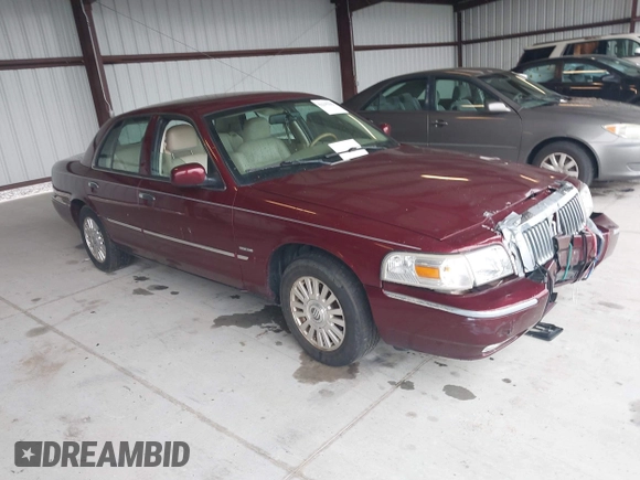 2006 Mercury Grand Marquis LS Premium z VIN 2MEHM75VX6X628404, wystawiony jako IAAI lot #42227639 z przebiegiem 170 132 mil mil oraz . Historia ofert i sprzedaży dostępna na DreamBid. Obrazek 1.