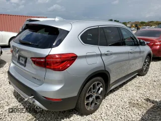 2021 BMW X1 sDrive28i with VIN WBXJG7C04M5S29295, listed as a Copart auction lot 48922203 with 14,214 mi miles. Bid and sale history available at carsss.com. Image 3.