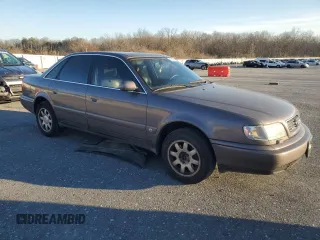 1995 Audi A6 z VIN WAUGA84A2SN055887, wystawiony jako Copart lot #85212394 z przebiegiem 254 307 mil mil oraz Tytuł czysty. Historia ofert i sprzedaży dostępna na DreamBid. Obrazek 4.