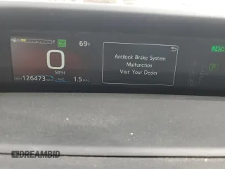 2021 Toyota Prius L Eco with VIN JTDKAMFUXM3149396, listed as a Copart auction lot 61874195 with 126,473 mi miles and Salvage title. Bid and sale history available at DreamBid. Image 9.