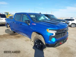 2023 Chevrolet Silverado 1500 LT Trail Boss with VIN 3GCUDFED9PG117005, listed as a IAAI auction lot 41505108 with 14,575 mi miles and . Bid and sale history available at DreamBid. Image 1.