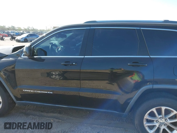 2014 Jeep Grand Cherokee Laredo with VIN 1C4RJEAG7EC263590, listed as a IAAI auction lot 41699106 with 136,581 mi miles and . Bid and sale history available at DreamBid. Image 15.