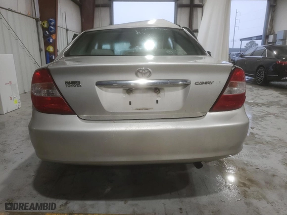 2004 Toyota Camry LE with VIN 4T1BE32K94U915756, listed as a Copart auction lot 50761005 with 404,136 mi miles and Salvage Title. Bid and sale history available at carsss.com. Image 6.