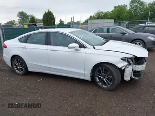 2020 Ford Fusion Titanium with VIN 3FA6P0RUXLR139574, listed as a IAAI auction lot 42299070 with 92,751 mi miles and . Bid and sale history available at DreamBid. Image 14.