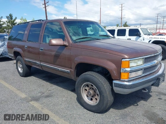 1999 Chevrolet Suburban with VIN 1GNGK26J9XJ494147, listed as a IAAI auction lot 41945149 with 102,652 mi miles. Bid and sale history available at carsss.com. Image 1.