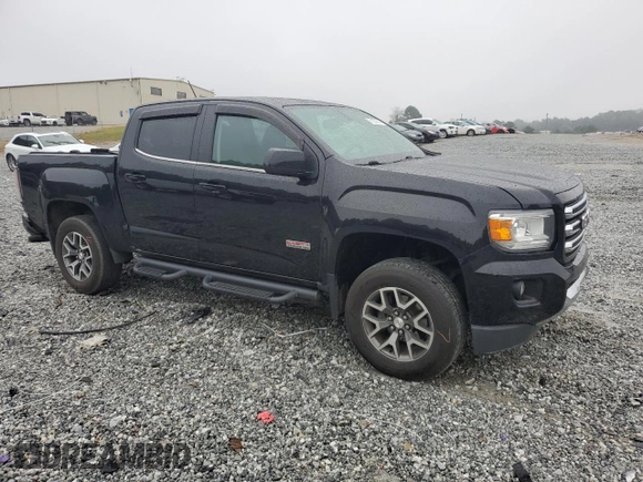 2015 GMC Canyon 4WD SLE with VIN 1GTG6BE37F1157166, listed as a Copart auction lot 71279914 with 114,484 mi miles and Salvage Title. Bid and sale history available at carsss.com. Image 4.