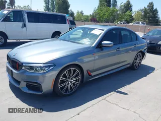 2019 BMW 5 Series 540i with VIN WBAJE5C55KWW11827, listed as a IAAI auction lot 42191127 with 72,113 mi miles and . Bid and sale history available at DreamBid. Image 2.