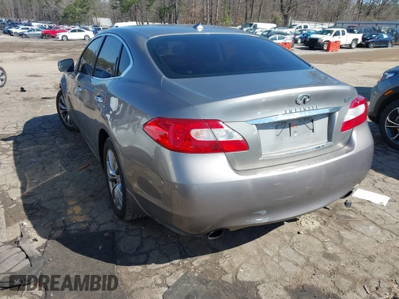 2012 Infiniti M with VIN JN1BY1AP3CM331819, listed as a IAAI auction lot 41773311 with 321,644 mi miles and . Bid and sale history available at DreamBid. Image 3.