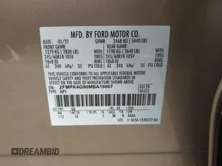 2021 Ford Edge SE with VIN 2FMPK4G90MBA19667, listed as a IAAI auction lot 42215758 with 27,496 mi miles and . Bid and sale history available at DreamBid. Image 9.