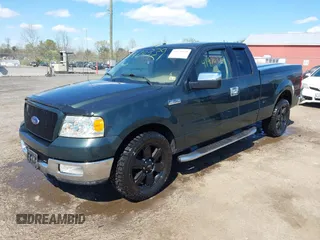 2004 Ford F-150 STX with VIN 1FTRX12W34NA32685, listed as a IAAI auction lot 41970339 with 166,869 mi miles. Bid and sale history available at carsss.com. Image 2.