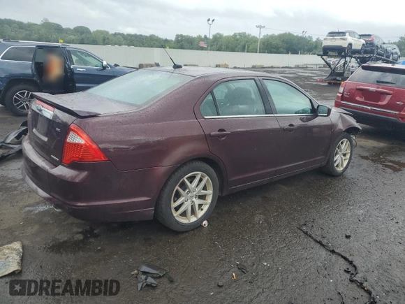 2012 Ford Fusion SEL with VIN 3FAHP0JG1CR358874, listed as a Copart auction lot 86041954 with 59,964 mi miles and Salvage Title. Bid and sale history available at DreamBid. Image 3.
