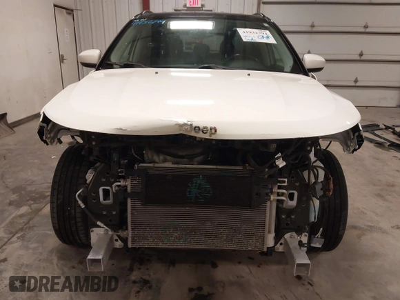 2019 Jeep Compass Latitude with VIN 3C4NJDBB0KT834607, listed as a IAAI auction lot 41932794 with 74,694 mi miles. Bid and sale history available at carsss.com. Image 6.