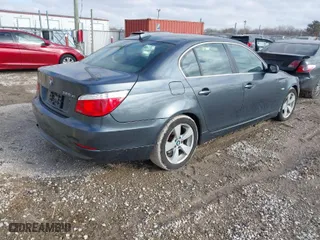 2008 BMW 5 Series 528xi with VIN WBANV13558CZ52729, listed as a IAAI auction lot 41406318 with 165,570 mi miles. Bid and sale history available at carsss.com. Image 4.