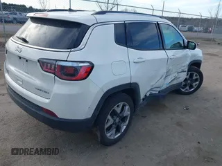 2020 Jeep Compass Limited with VIN 3C4NJDCB8LT127027, listed as a IAAI auction lot 41724110 with 94,896 mi miles and . Bid and sale history available at DreamBid. Image 4.