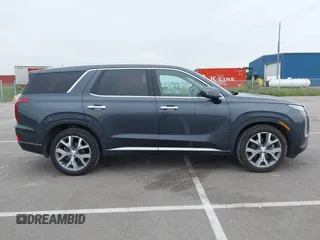 2021 Hyundai Palisade SEL with VIN KM8R4DHE0MU205427, listed as a IAAI auction lot 42436615 with 53,759 mi miles and . Bid and sale history available at DreamBid. Image 13.