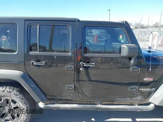 2008 Jeep Wrangler Unlimited Rubicon with VIN 1J8GA69198L574593, listed as a IAAI auction lot 41412045 with 174,727 mi miles and . Bid and sale history available at DreamBid. Image 14.