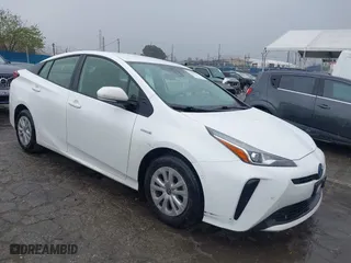 2021 Toyota Prius L Eco with VIN JTDKAMFU6M3141019, listed as a IAAI auction lot 41821212 with 202,756 mi miles. Bid and sale history available at carsss.com. Image 1.