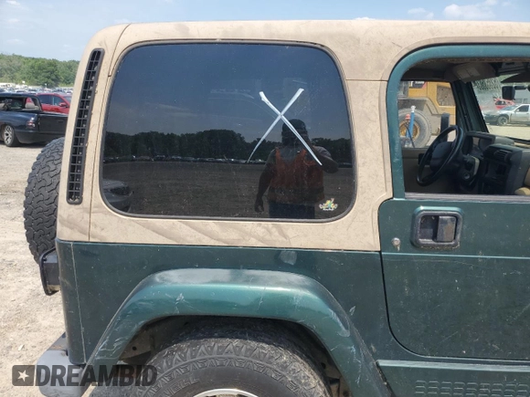 2000 Jeep Wrangler Sahara with VIN 1J4FA59S2YP750795, listed as a Copart auction lot 52353503 with 0 mi miles and Salvage Title. Bid and sale history available at carsss.com. Image 10.