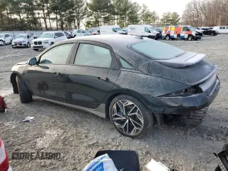 2023 Hyundai IONIQ 6 SEL with VIN KMHM34AC1PA025787, listed as a Copart auction lot 86628914 with 32,185 mi miles and Salvage Title. Bid and sale history available at carsss.com. Image 2.