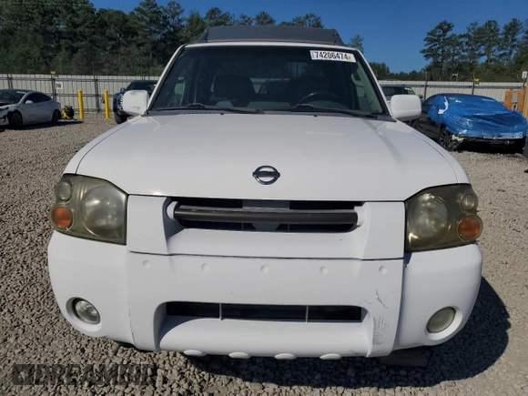 2002 Nissan Frontier SE z VIN 1N6ED27T42C319065, wystawiony jako Copart lot #74206474 z przebiegiem 147 724 mil mil oraz Szkoda całkowita • Salvage title. Historia ofert i sprzedaży dostępna na DreamBid. Obrazek 5.
