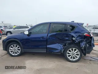 2013 Mazda CX-5 Grand Touring with VIN JM3KE2DE3D0168529, listed as a IAAI auction lot 41884766 with 173,558 mi miles. Bid and sale history available at carsss.com. Image 15.